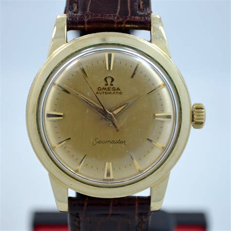 who buys old omega watches.